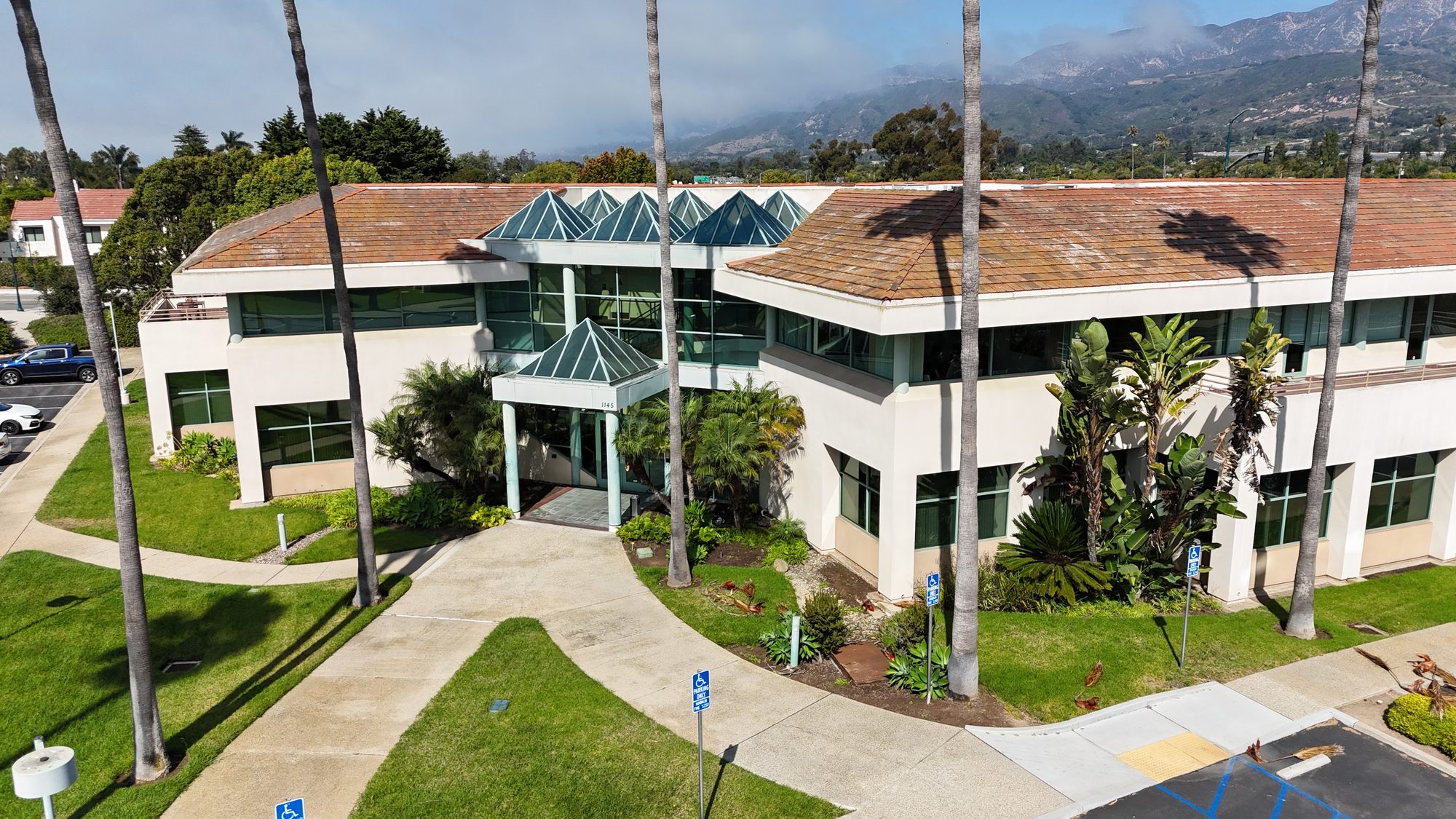 Aerial view of Eugenia Plaza with the Santa Ynez Mountains behind
