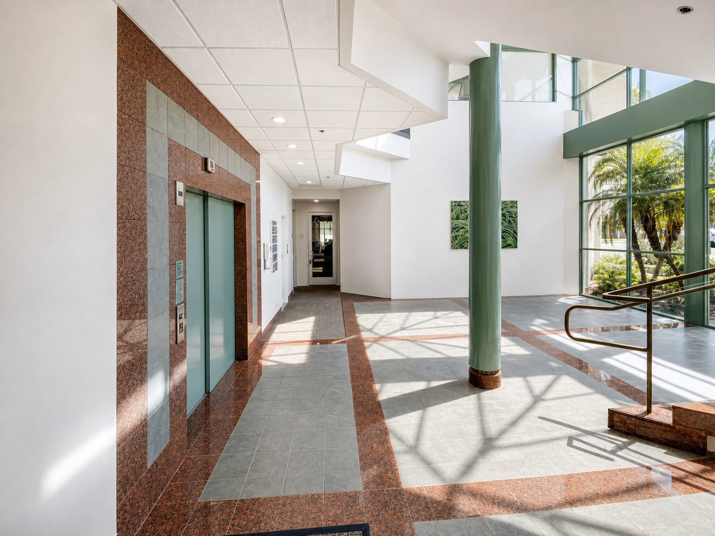 Ground-floor lobby corridor serving Suite 100C
